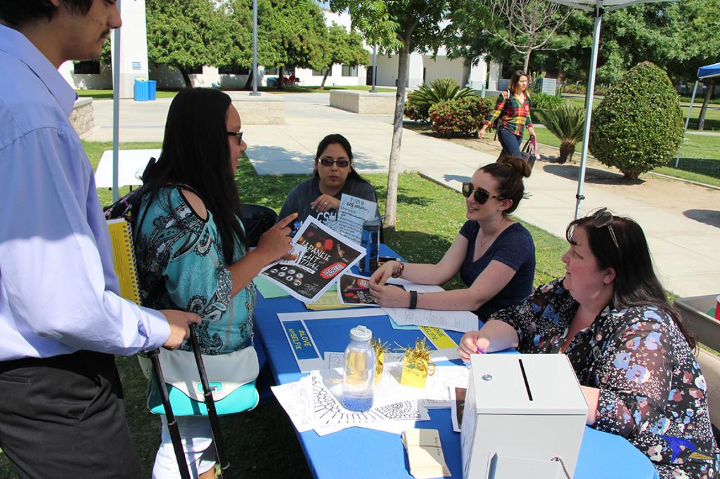 Trevante Hammonds/The Runner Fellow CSUB students interacting at the health fair to get tips on how to live a healthy life on Wednesday, May 11 outside the Student Union patio.