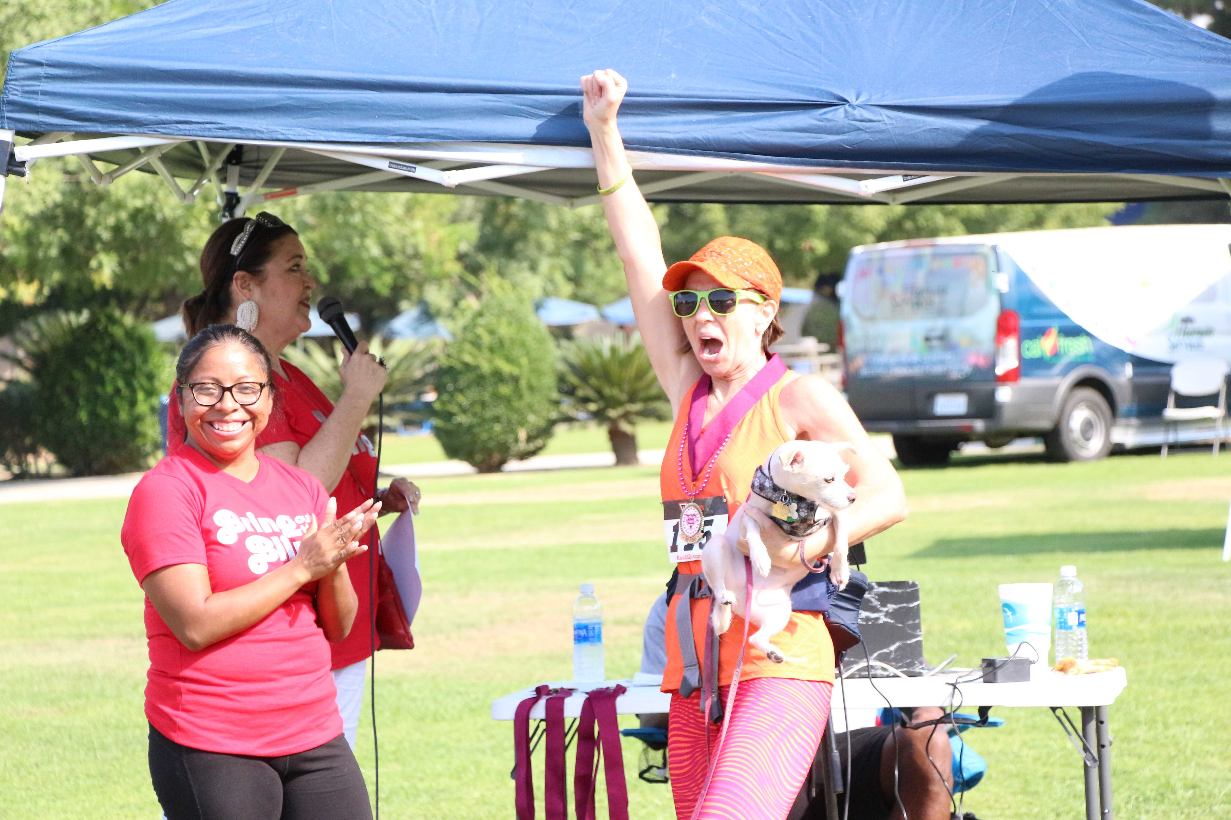 Sara Danville won first place in her age group at the Bring out the Bling 5K Fun Run benefitting Dress for Success Bakersfield at CSUB on Saturday. Photo by Alejandra Flores/ The Runner