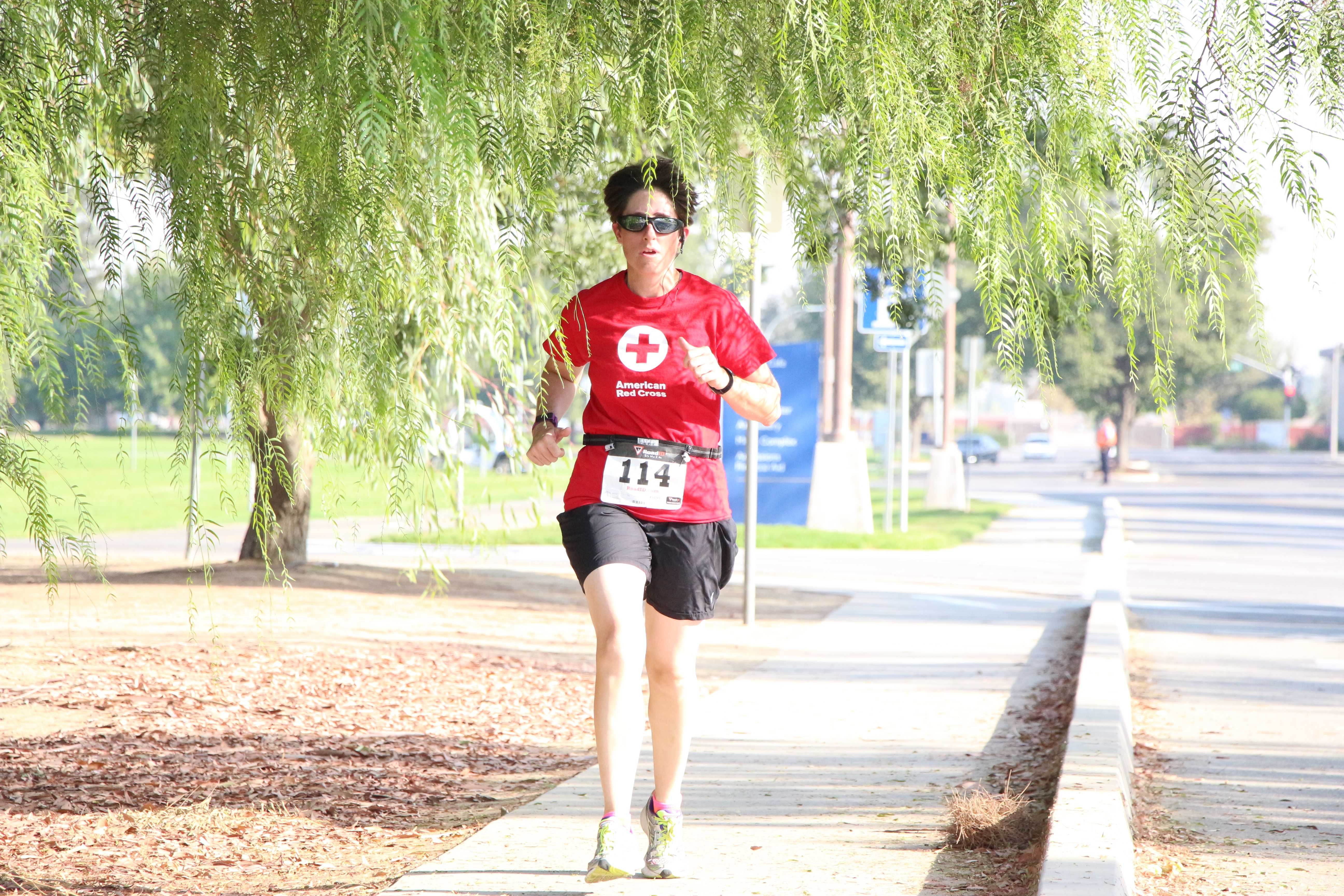Alejandra Flores/ The Runner Theresa Bly making her way through the 5K Fun Run course benefitting the organization Dress for Success on Saturday at CSUB.