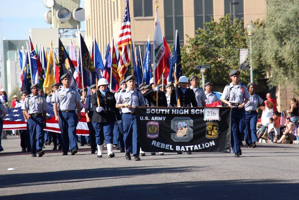 Students from the South High School Rebel Battalion March during the Veterans Day Parade. Photo by Alejandra Flores/The Runner 