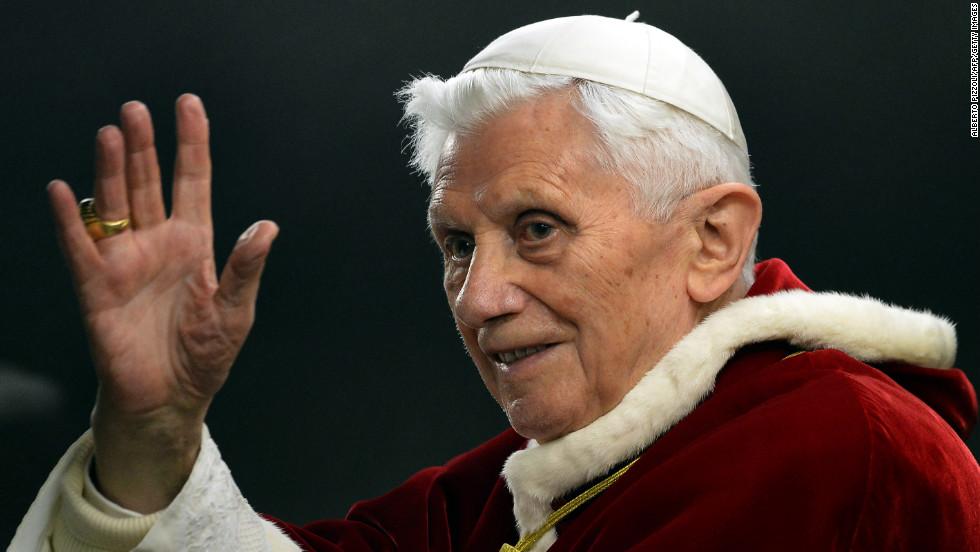 The Pope waves to members of the Vatican in December 2012, two months before announcing his resignation. Image from npr.org