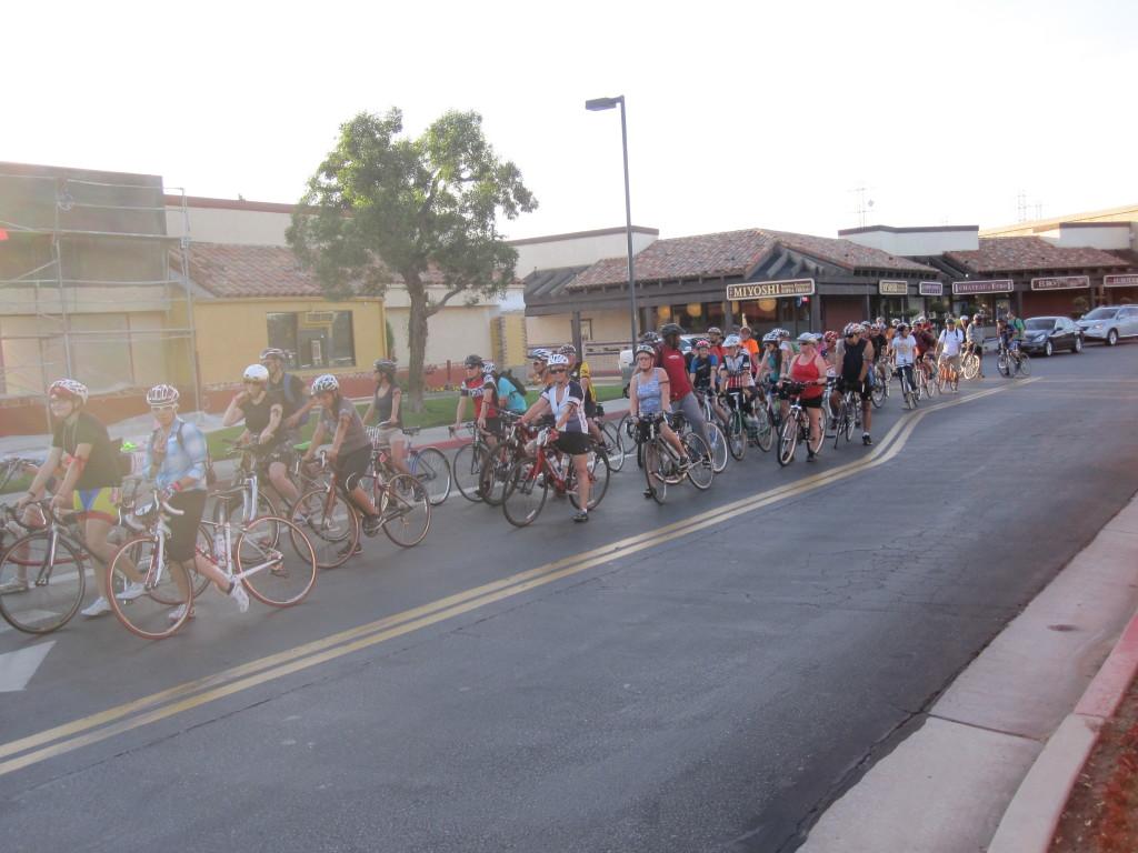 A group of cyclists line up at Town and Country Village to start their route for the Ride of Silence on May 15. (Tara Baraceros/The Runner).