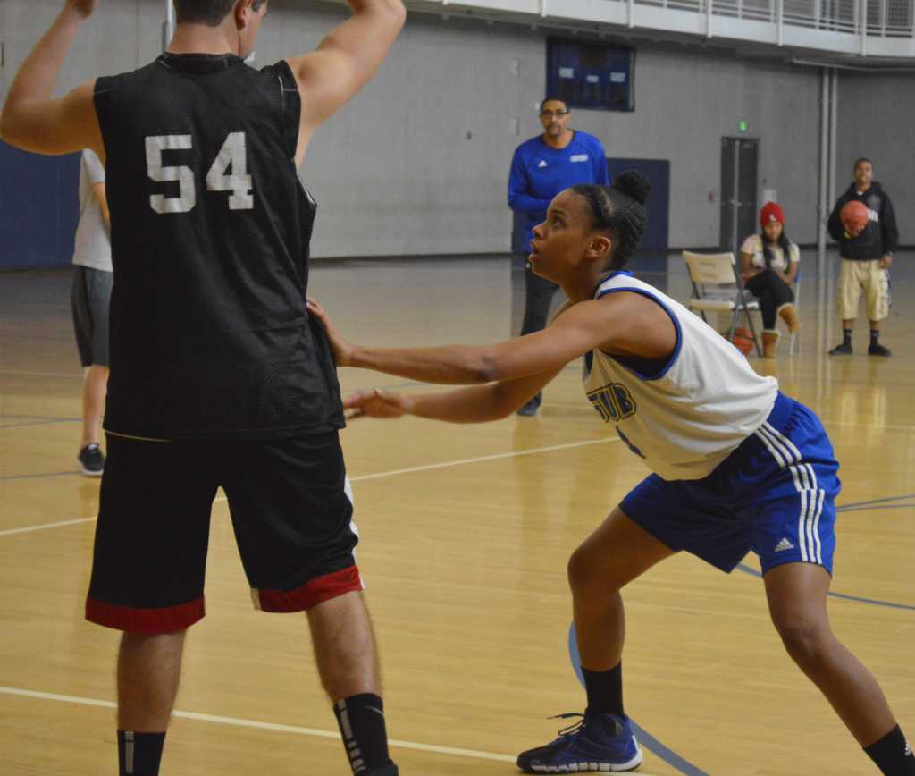 California State University, Bakersfield women’s basketball team member, Lunden Reliford, keeps her gaze on the ball at practice on October 30 in the student recreation center.