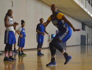 California State University, Bakersfield women’s basketball team member, Brittany Simms, watches out for the ball during practice on October 30 in the student recreation center.