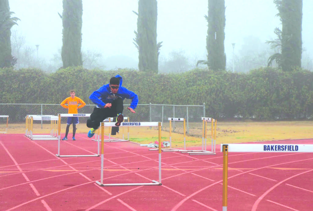 Richard Maestre jumping the hurdles during practice on Jan. 16.