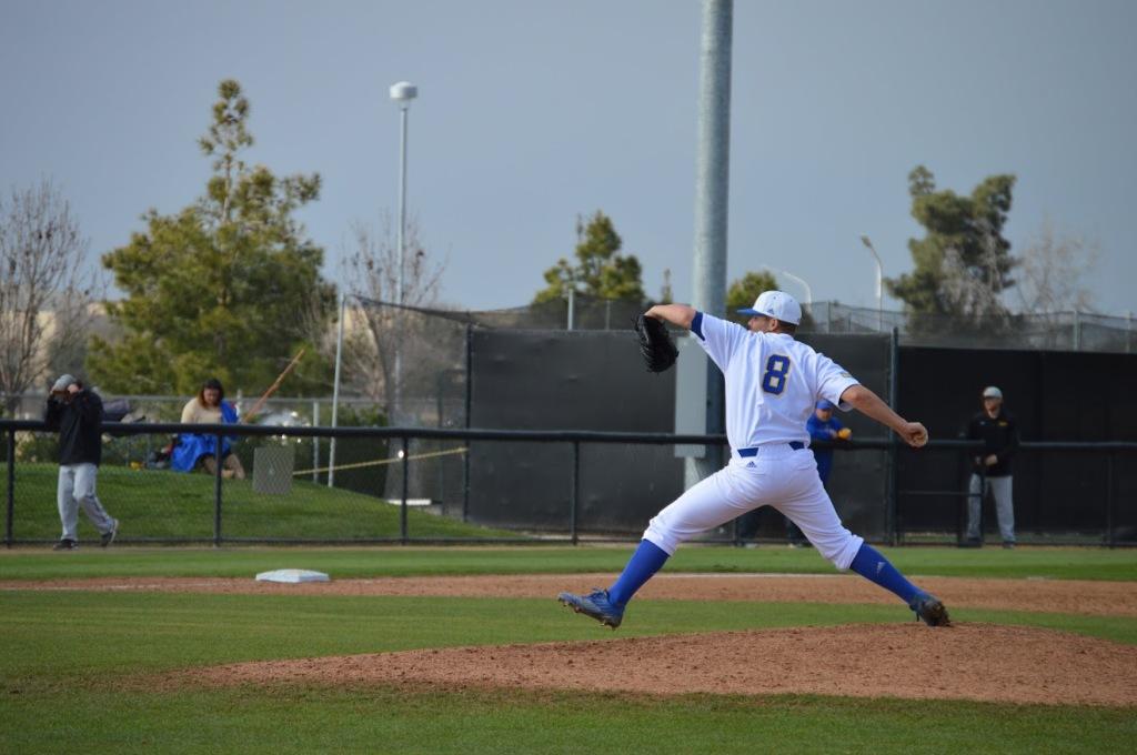 CSUB’s sophomore pitcher Max Carter winds up for a pitch against Northern Kentucky University on Feb. 22. Roadrunners beat the Norse 11-5 on Sunday to take the series 3-1. 
Photo by Janeane Williams/The Runner