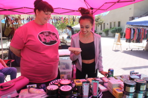Kim Cook of Posh showing her products to Stephany Nguyen on Wednesday, May 6 on the Redbrick road