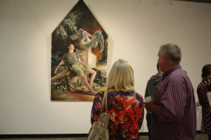 Two guest admiring the work of Luke Boyd at the opening of Nexus senior art exhibition on Thursday, May 14 at Todd Madigan Gallery
