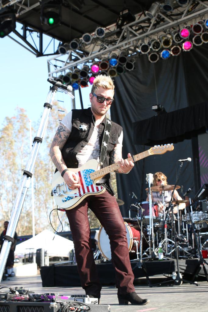 Gloriana lead guitarist Mike Mossin rocking out during the performance on the KUZZ main stage at the Rock and Country Music festival. AJ Alvarado/The Runner