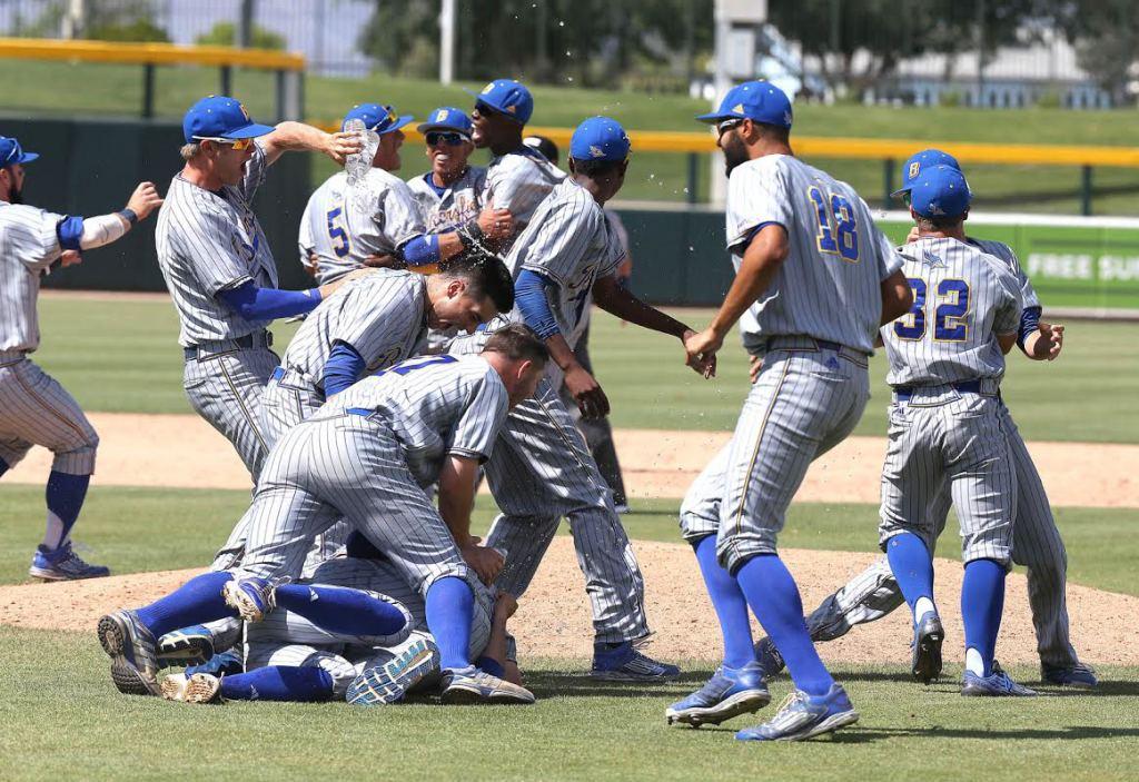 The CSUB baseball team celebrates its victory over Seattle on May 24 at Hohokam Stadium.
Photo by Darryl Webb/WAC