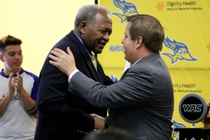 CSUB President Horace MItchell congratulates new Athletic Director Kenneth Siegfried during a press conference at the Icardo Room on Aug. 20.  Photo from Diana Olivares/ Athletics department