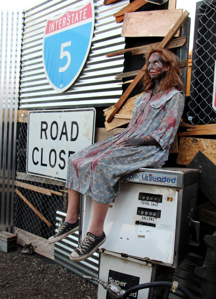 An actor sits in character as a zombie for the Talladega Frights horror attraction on Oct. 22.