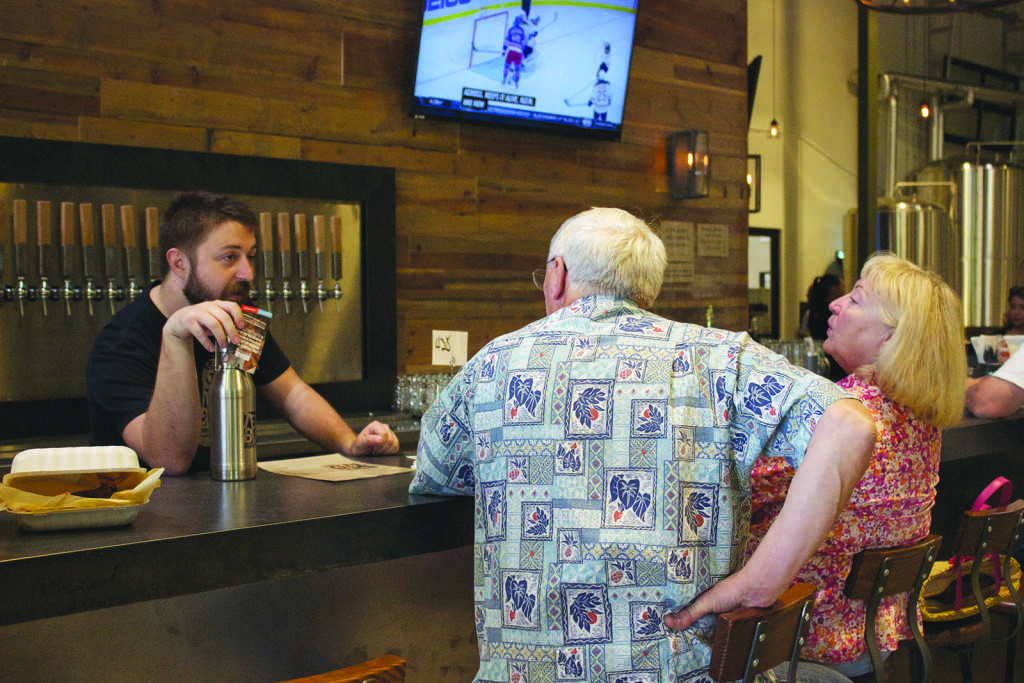 Bre Williams/ The Runner
Matt Schauer talks with customers on Oct. 1 at Temblor Brewing Company. The brewery hosts live local music in addition to offering beer. The concerts are for those over 21, usually taking place on the weekends.
Photo by Bre Williams/The Runner