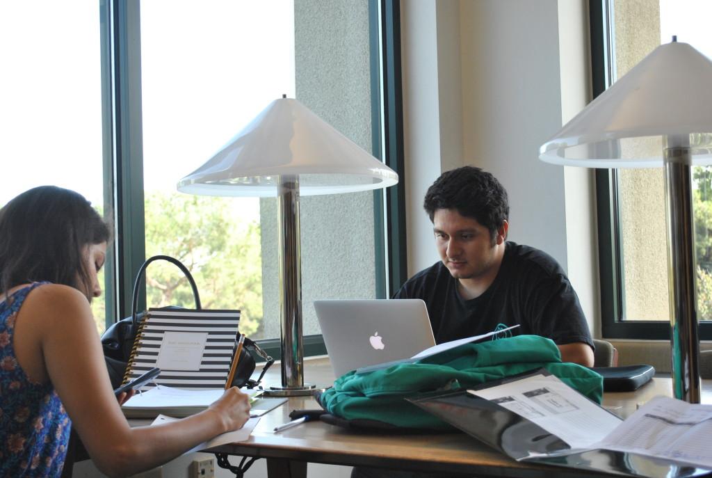 CSUB junior Itzi Andrade works on his laptop at the Walter Stiern  Library on Sept. 28.
Photo by Graham C Wheat/The Runner