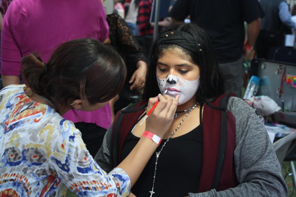 Community member Sylvia Luego gets her face painted on Sunday, Nov. 1 at the Bakersfield Museum of Art as part of the Dia de los Muertos festivities. 