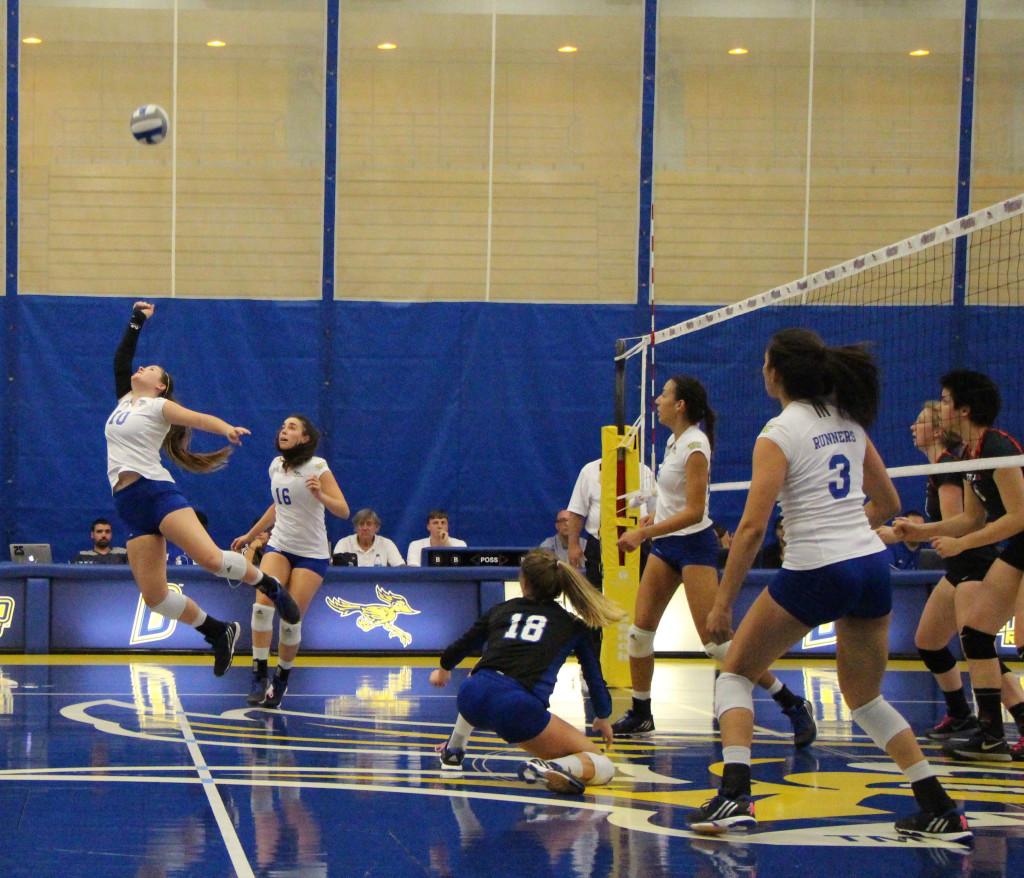 CSUB's freshman defensive specialist Morginne Demarco attempts to save a point against Seattle University on Thursday in the Icardo Center. CSUB beat Seattle, 3-1.
Photo by Marisel Maldonado/The Runner