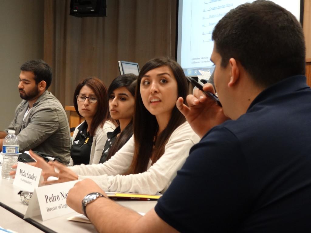 ASI board members discuss why eliminating the vice president of external affairs position is an unwise choice at the meeting on Friday. 
Photo by Chris Mateo/The Runner