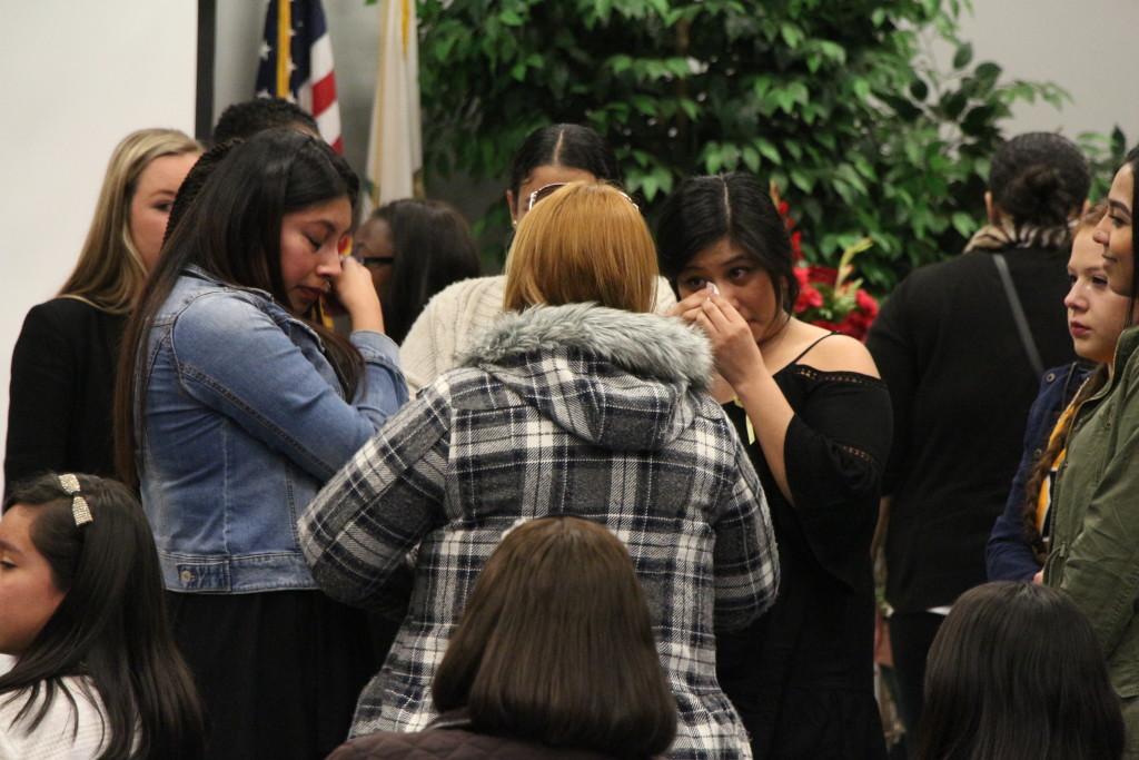 CSUB alumna Elizabeth Ascencio’s friends shared memories, hugs and condolences with her mother at the memorial service hosted by Phi Sigma Sigma sorority. 
Photo by Alejandra Flores/The Runner