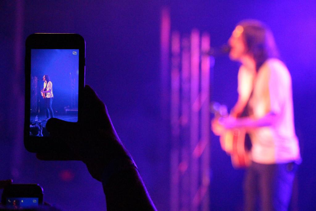 A CSUB student takes a photo of Craig Strickland, who opened for Alessia Cara on April 23.
Photo by Alejandra Flores/The Runner