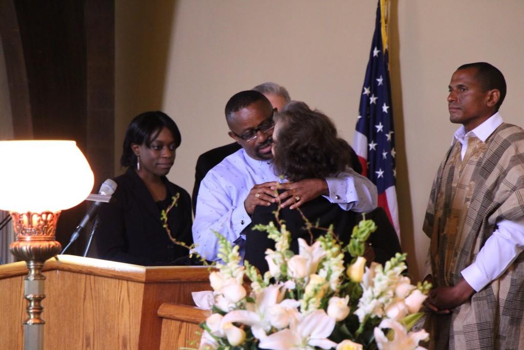 CSUB professor Andy Alali shares his condolences and hugs Solomon Iyasere's wife, Marla Iyasere at the memorial service on April 9.
Photo by Alejandra Flores/The Runner