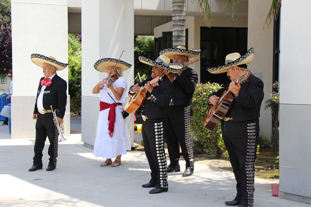 A Mexican Mariachi playing for students during Cinco de Mayo festitivies. 
Photo by James Chavez/The Runner