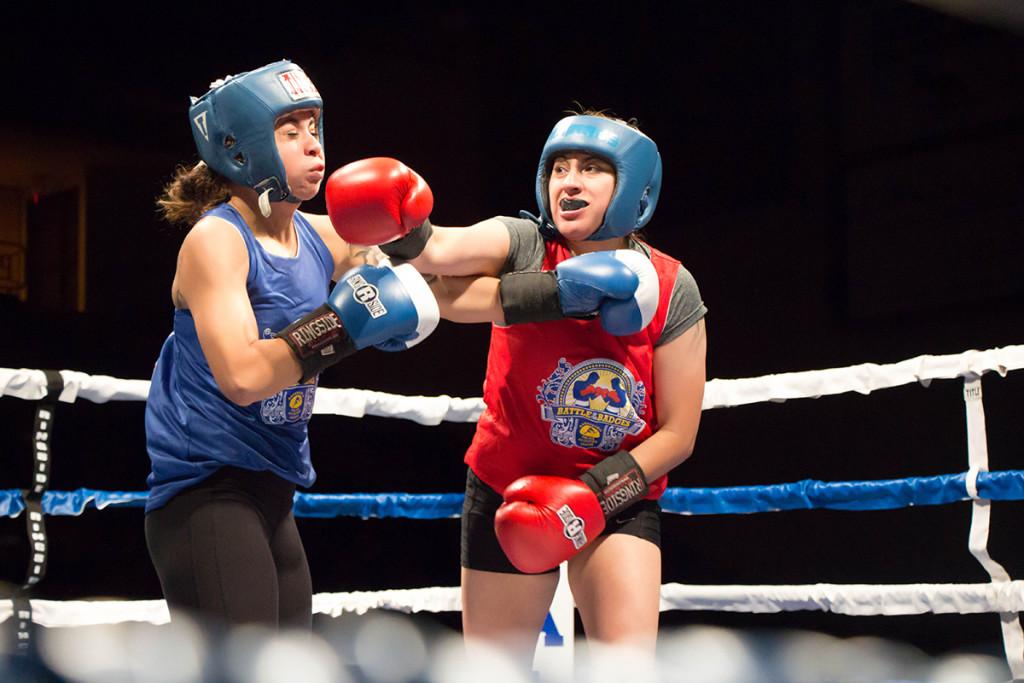 Elizabeth Alvarez of Tehachapi Police Department lands a damaging right to Lorena Vasquez of Bakersfield Police Department on Friday, May 20 at the Icardo Center.
Photo by Trevante Hammonds/The Runner