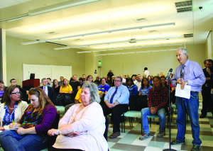 CSUB professor John Tarjan asks a question to CSU Chancellor Timothy White on April 29 in MPR Student Housing East. Photo by Julie Mana-ay/The Runner
