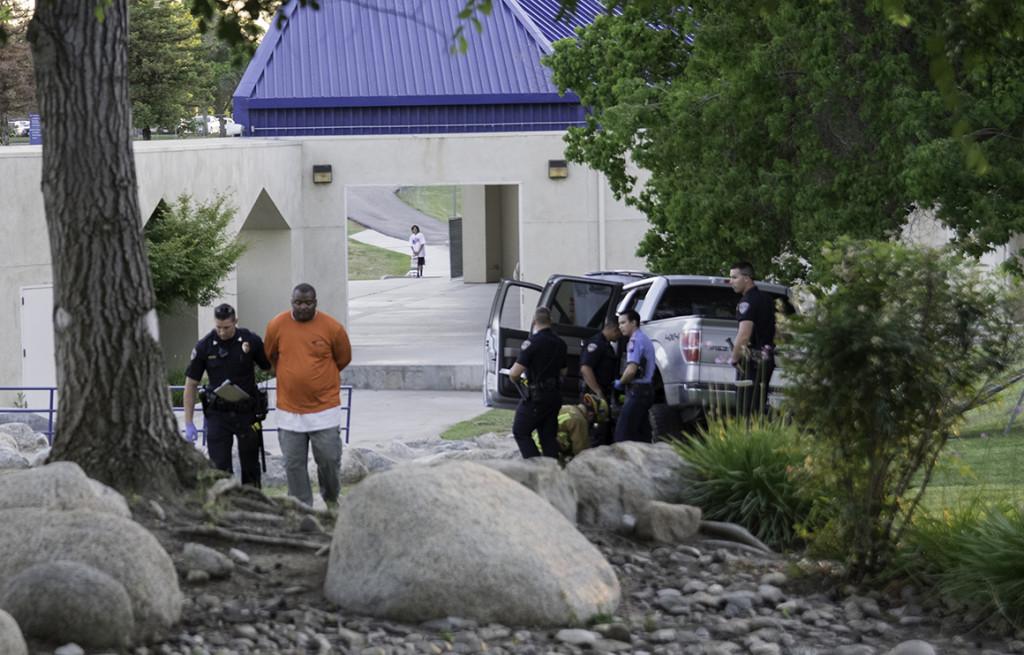 The driver of the Ford truck gets detained by the Bakersfield Police Department on Tuesday. Photo by Ben Patton/The Runner