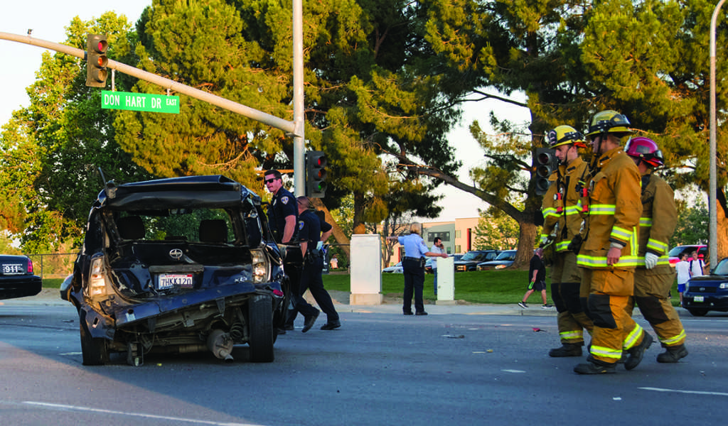 The Bakersfield Police Department and Fire Department arrive on the scene of the accident on Tuesday. Photo by Ben Patton/The Runner