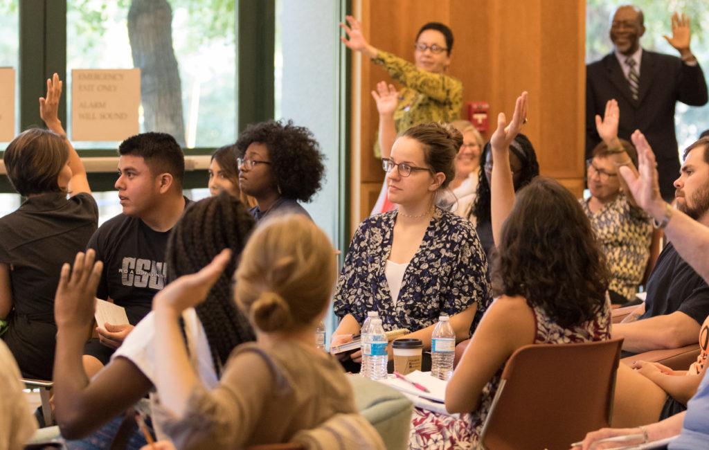 Audience members raise their hands in response to the question, “How many of you have already decided who you are voting for?” posed by David Schecter during the “Election, Politics, and God” event on Sept. 15 in the Walter Stiern Library.
Photos by Ben Patton/The Runner