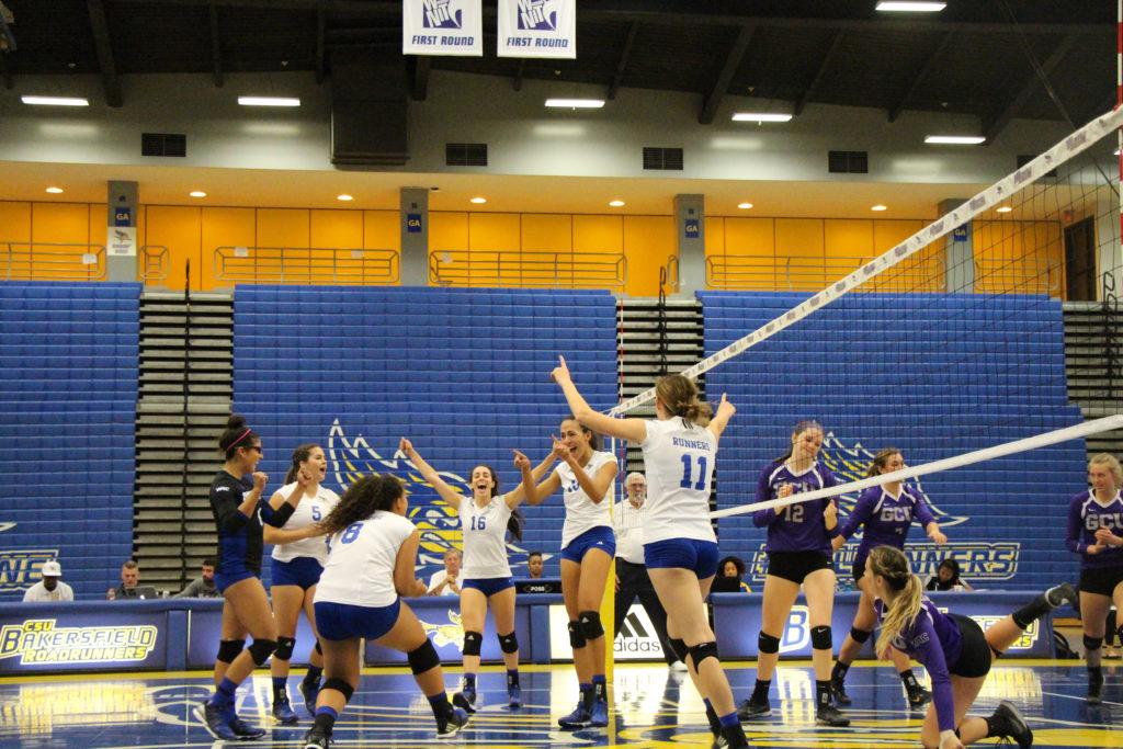 The Roadrunners celebrate a win against UTRGV on May 2 after losing three straight set against New Mexico State.