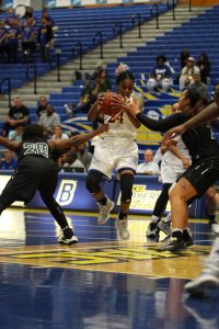 CSUB's Aja Williams attempts to hop step past the Hawai'i defense on Nov. 13 at the Icardo Center. Photo by Alejandra Flores/The Runner 