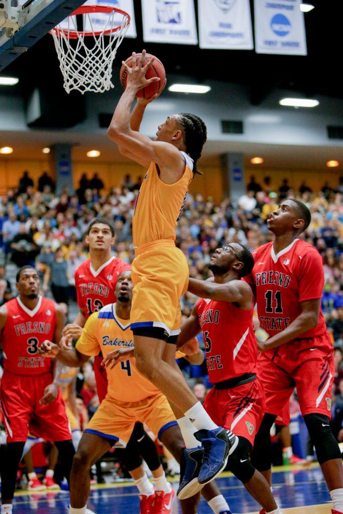 Redshirt-junior forward Matt Smith goes up for a shot against Fresno State.
Photo by AJ Alvarado/The Runner