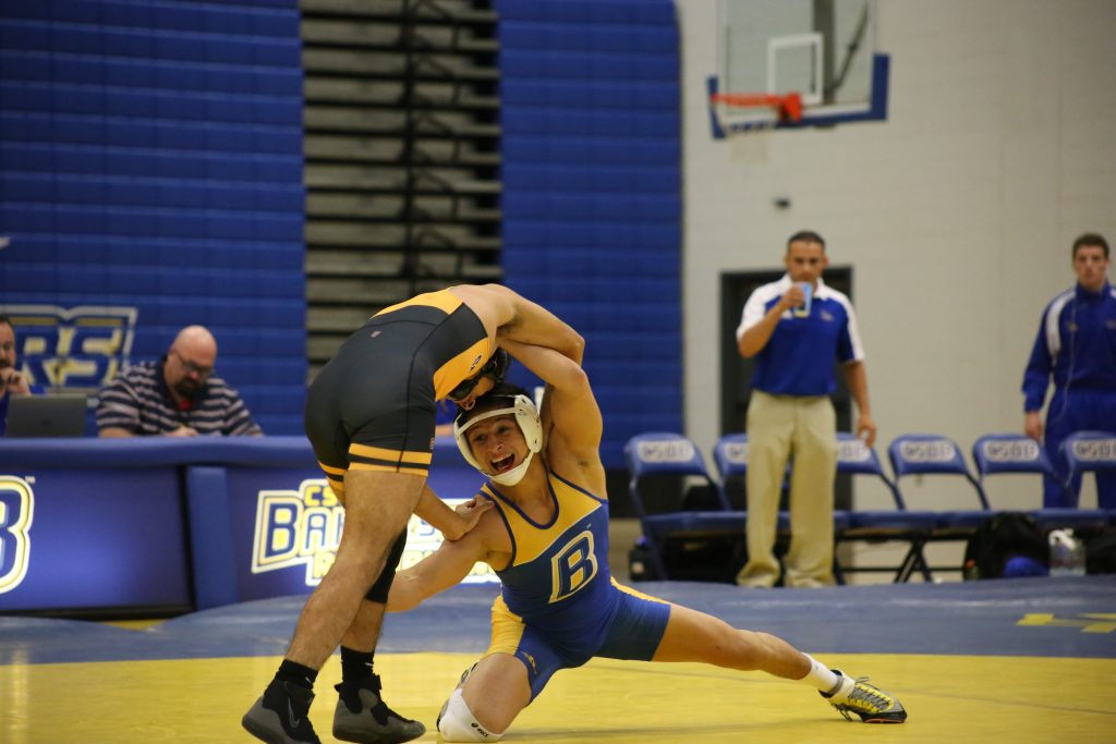 Karina Diaz CSUB's Carlos Herrera shoots for a takedown against San Francisco State's Nate Cervantez Nov. 11 at the Icardo Center.
Photo by Karina Diaz/The Runner