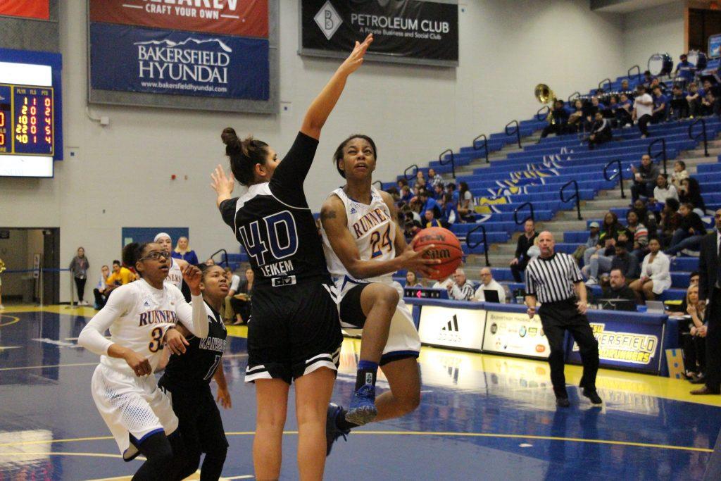 Freshman forward Aja Williams goes up for a layup at the Icardo Center on Saturday, Jan. 28.
Photo by Trevante Hammonds/The Runner 