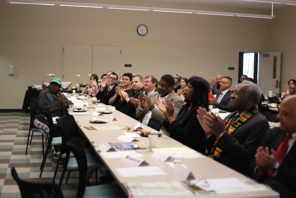 Attendees welcome keynote speaker Chief Lyle Martin with a round of applause. 
By Karina Diaz/ The Runner 