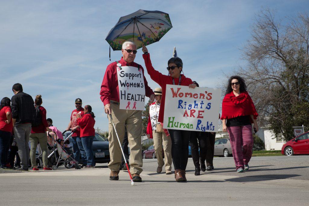 Bill Jones of Bakersfield marched in downtown Bakersfield Wednesday, March 8.
Photo by AJ Alvarado/The Runner 