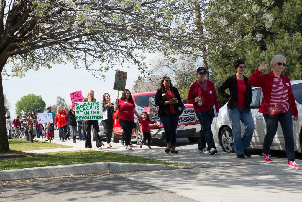 Marchers walk down the streets of downtown Bakersfield in support of women's rights Wednesday, March 8.
Photo by AJ Alvarado/The Runner