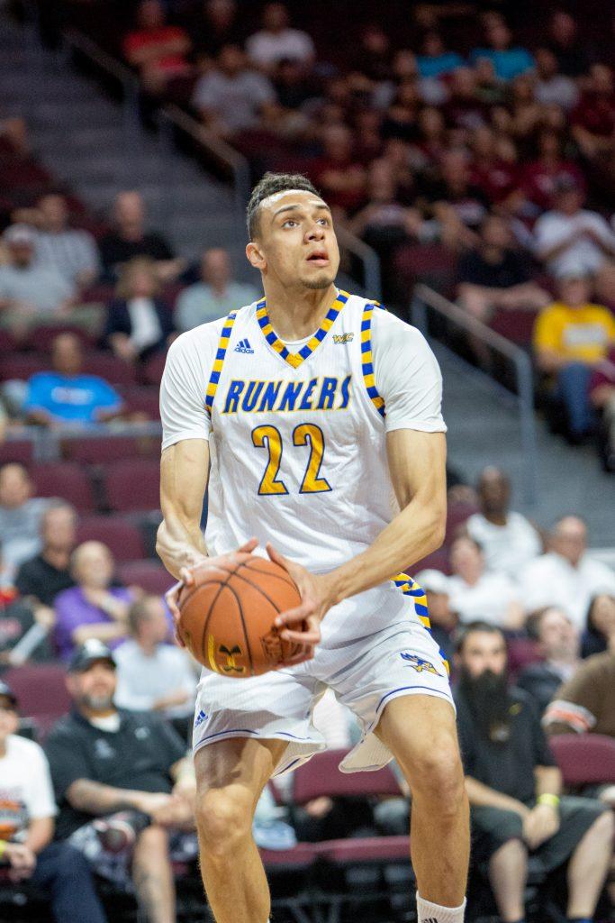 Junior center Moataz Aly sets up to go up for a shot against New Mexico State.
Photo by AJ Alvarado/The Runner