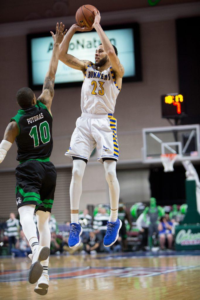 Guard Damiyne Durham goes up for a shot against Utah Valley guard Jordan Poydras at the Orleans Arena in Las Vegas.  