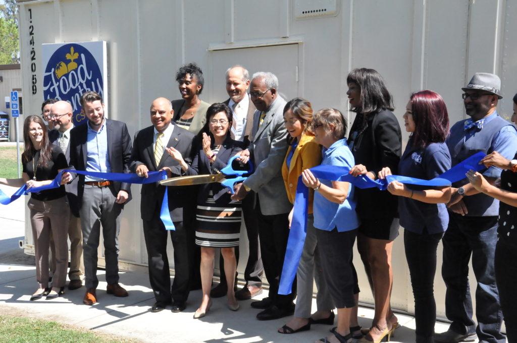 Mayor Goh helps CSUB President Mitchell cut the ribbon. Photo by Jarad Mann/The Runner