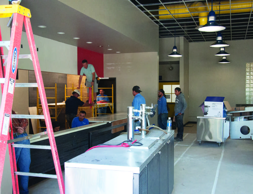 Construction workers work diligently to finish the Panda Express currently under construction in the CSUB student union. 
Photo by Jarad Mann/ The Runner 