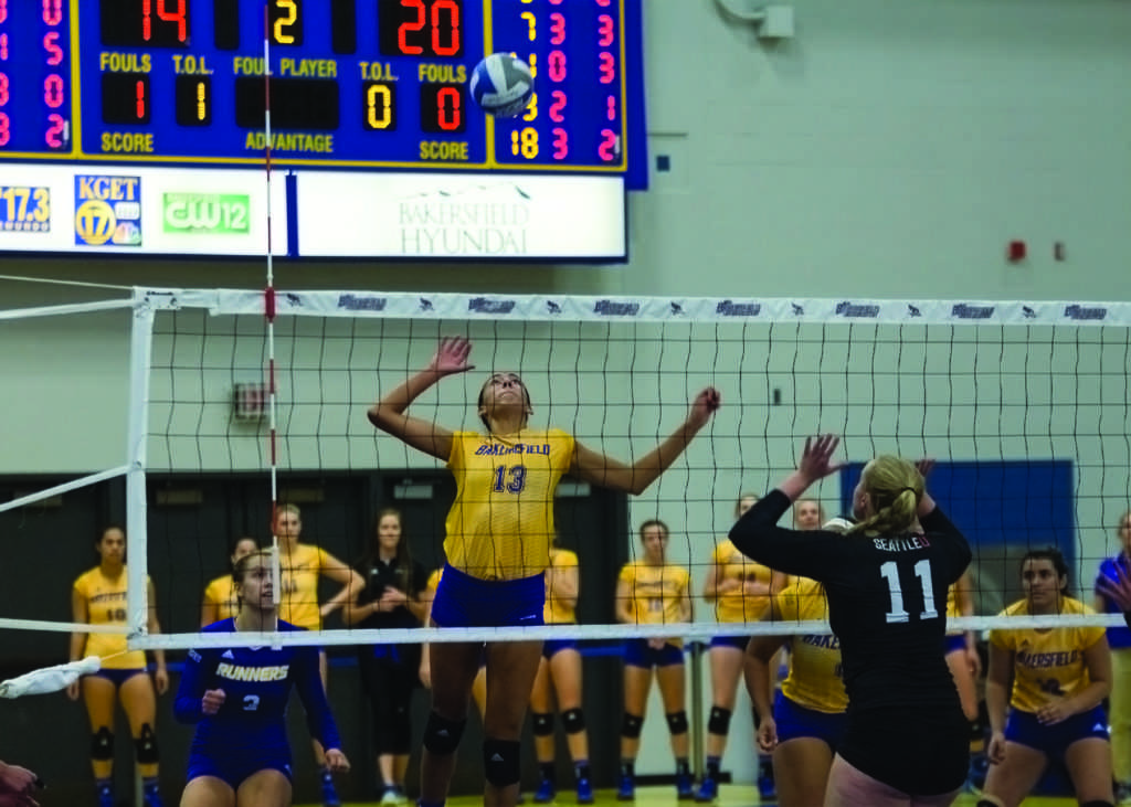 Redshirt-senior middle blocker Sydney Haynes goes for the kill against Victoria Demmene of Seattle University on Sept. 28. The Roadrunners swept Seattle U in three sets.
Photo by Scot Swan/The Run