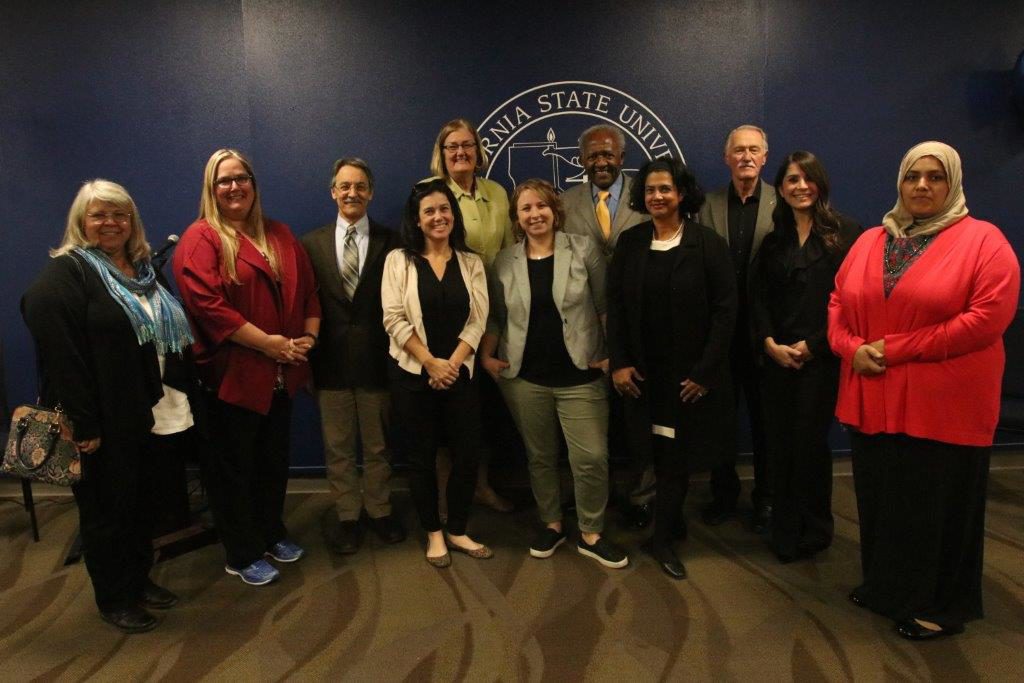 Photo courtesy of Elaine Correa / CSUB CAFS Dept.
From left to right: Mrs. Lisa Duncan-Purcell, Dr. Christie Howell, Dean Bacon, Provost Zorn, President Mitchell, Retired Dean, 
Front row,: Ms. Amanda Tumblin, Dr. April LaGue, Dr. Elaine Correa (Chair of CAFS), Mrs. Jamie Dwyer, and Mrs. Carolyn Lane
