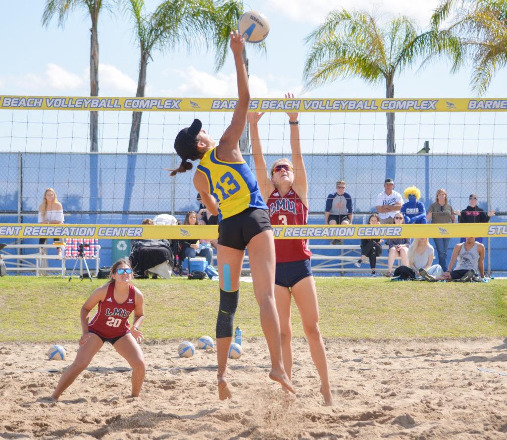 CSU Bakersfield senior Sydney Haynes goes for a kill on Saturday, March 24, at the Barnes Beach Volleyball Complex.