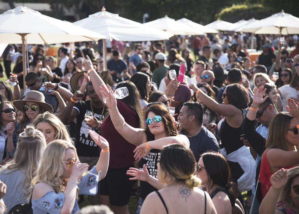 Photo by Simer Khurana / The Runner
People dance at the 5th Annual Macaroni and Cheese Festival, held at CSUB on April 21, 2018.