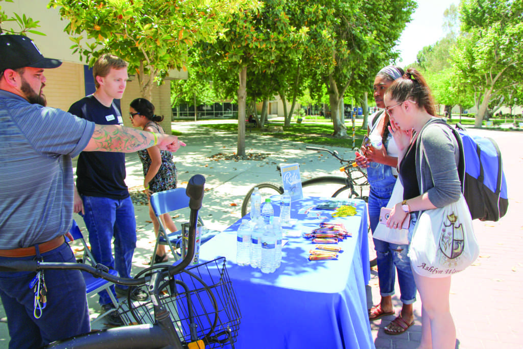 Andrew Paredez/The Runner
CSUB students Ashlyn Wareckiy and Tajsiana Tapp came out to support and ask
questions about the Bike to School event that took place at CSUB on Wednesday, May
09, 2018.