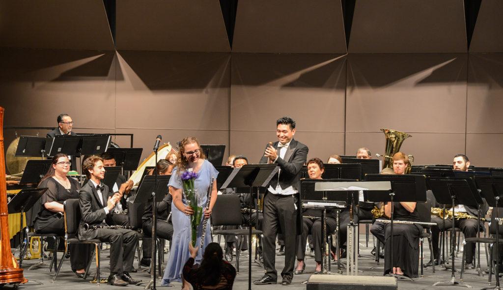 Ana Canales/The Runner
Katelyn Willey receives a bouquet of flowers from the audience after her performance
during the CSUB Concert Band Spring Concert on Saturday, May 5, 2018.