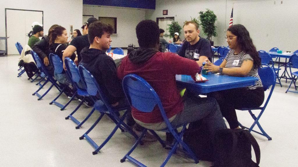 Students begin to break the ice over snacks and drinks on Wednesday, Feb. 13, 2019.

Leo Garcia/The Runner