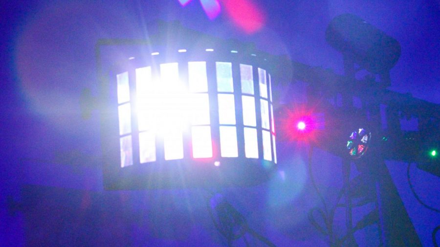 Lights shine down upon the Runner Dance Marathon on Mar 9 in the Student Union Multi-Purpose Room.